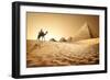 Bedouin on Camel near Pyramids in Desert-Givaga-Framed Photographic Print