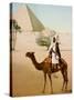 Bedouin on camel on the Giza plateau in Cairo. Ca. 1900-1910-null-Stretched Canvas