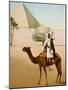 Bedouin on camel on the Giza plateau in Cairo. Ca. 1900-1910-null-Mounted Giclee Print