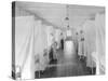 Beds Separated by Sheets to Isolate Patients During Spanish Flu Epidemic 1918-19-null-Stretched Canvas