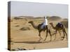 Bedu Rides His Camel Amongst the Sand Dunes in the Desert-John Warburton-lee-Stretched Canvas