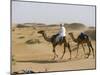Bedu Rides His Camel Amongst the Sand Dunes in the Desert-John Warburton-lee-Mounted Photographic Print