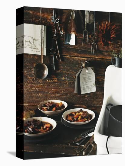 Beef Stew with Carrots and Potatoes in a Rustic Kitchen - Conde Nast Collection-null-Stretched Canvas