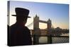 Beefeater and Tower Bridge, London, England, United Kingdom, Europe-Neil Farrin-Stretched Canvas