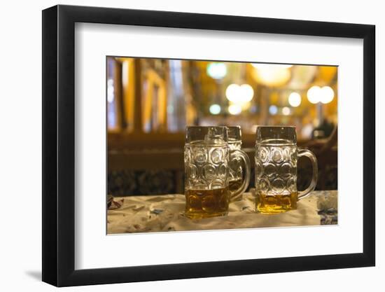 Beer mugs in a beer tent, Oktoberfest-Christine Meder stage-art.de-Framed Photographic Print