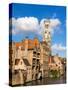 Belgium, Bruges. Belfry of Bruges at the junction of the Groenerei and Dijver canals.-Julie Eggers-Stretched Canvas