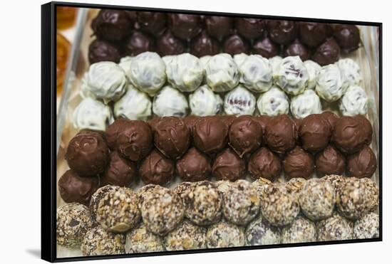 Belgium, Bruges. Belgian chocolate shop-Walter Bibikow-Framed Stretched Canvas