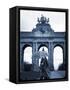 Belgium, Brussels; a Girl Walking with an Umbrella in Front of the Arc Du Triomphe-Ken Sciclina-Framed Stretched Canvas