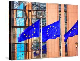 Belgium, Brussels; Three Flags Carrying the European Union Emblem in Front of the E;U Headquarters-Ken Sciclina-Stretched Canvas