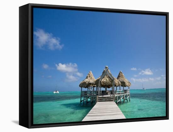 Belize, Ambergris Caye, San Pedro, Ramons Village Resort Pier and Palapa-Jane Sweeney-Framed Stretched Canvas