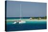 Belize, Wild Orchid Caye. Tourist Catamaran Along the Reef-Cindy Miller Hopkins-Stretched Canvas