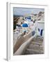 Bell Tower and Blue Domes of Church in Village of Oia, Santorini, Greece-Darrell Gulin-Framed Photographic Print