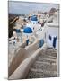 Bell Tower and Blue Domes of Church in Village of Oia, Santorini, Greece-Darrell Gulin-Mounted Photographic Print