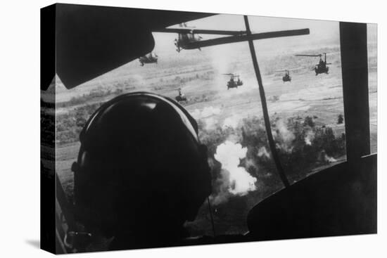 Bell Uh-1 Huey Squadron Firing on Vietcong-Dirck Halstead-Stretched Canvas