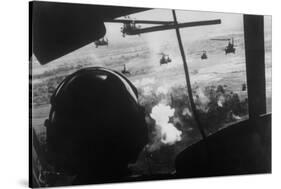 Bell Uh-1 Huey Squadron Firing on Vietcong-Dirck Halstead-Stretched Canvas