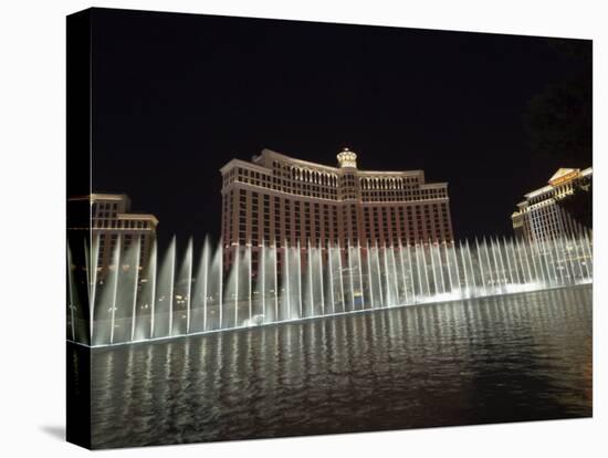 Bellagio Hotel at Night with its Famous Fountains, the Strip, Las Vegas, Nevada, USA-Robert Harding-Stretched Canvas