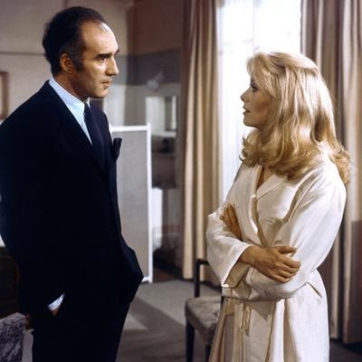 https://imgc.allpostersimages.com/img/posters/belle-by-jour-by-luis-bunuel-with-michel-piccoli-and-catherine-deneuve-1967-photo_u-L-Q1C3J9C0.jpg?artPerspective=n