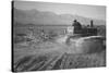 Benji Iguchi Driving Tractor in Field-Ansel Adams-Stretched Canvas