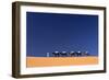 Berber Man Leading a Train of Camels over the Orange Sand Dunes of the Erg Chebbi Sand Sea-Lee Frost-Framed Photographic Print