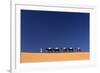 Berber Man Leading a Train of Camels over the Orange Sand Dunes of the Erg Chebbi Sand Sea-Lee Frost-Framed Photographic Print