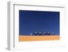 Berber Man Leading a Train of Camels over the Orange Sand Dunes of the Erg Chebbi Sand Sea-Lee Frost-Framed Photographic Print