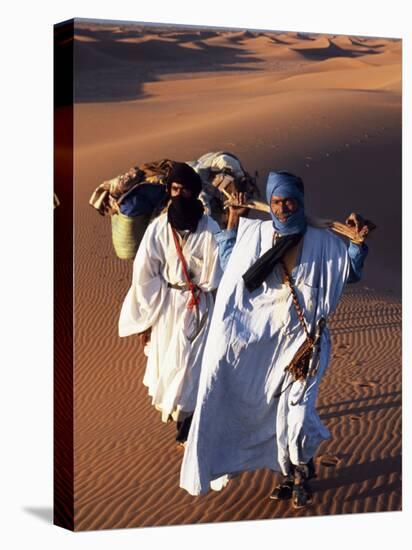 Berber Tribesmen Lead their Camels Through the Sand Dunes of the Erg Chegaga, in the Sahara Region -Mark Hannaford-Stretched Canvas