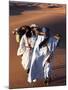 Berber Tribesmen Lead their Camels Through the Sand Dunes of the Erg Chegaga, in the Sahara Region -Mark Hannaford-Mounted Photographic Print