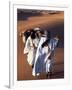 Berber Tribesmen Lead their Camels Through the Sand Dunes of the Erg Chegaga, in the Sahara Region -Mark Hannaford-Framed Photographic Print