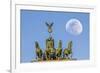 Berlin, Germany. Close-up of the Quadriga atop the Brandenburg gate with the full moon.-Miva Stock-Framed Photographic Print