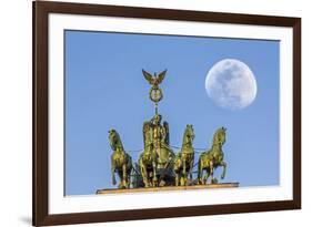 Berlin, Germany. Close-up of the Quadriga atop the Brandenburg gate with the full moon.-Miva Stock-Framed Photographic Print