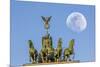 Berlin, Germany. Close-up of the Quadriga atop the Brandenburg gate with the full moon.-Miva Stock-Mounted Photographic Print