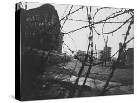 Berlin Wall Stretches Divisionally Between Buildings That Were Once on Common Ground-Paul Schutzer-Stretched Canvas