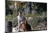 Bernadette Lafont, as a young woman, with her dog in Nimes, south of France, c. 1955 (photo)-null-Mounted Photo