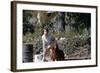 Bernadette Lafont, as a young woman, with her dog in Nimes, south of France, c. 1955 (photo)-null-Framed Photo