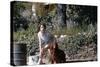 Bernadette Lafont, as a young woman, with her dog in Nimes, south of France, c. 1955 (photo)-null-Stretched Canvas