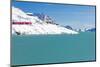 Bernina Express train in the snowy valley surrounded by Lake Bianco, Bernina Pass, Canton of Graubu-Roberto Moiola-Mounted Photographic Print