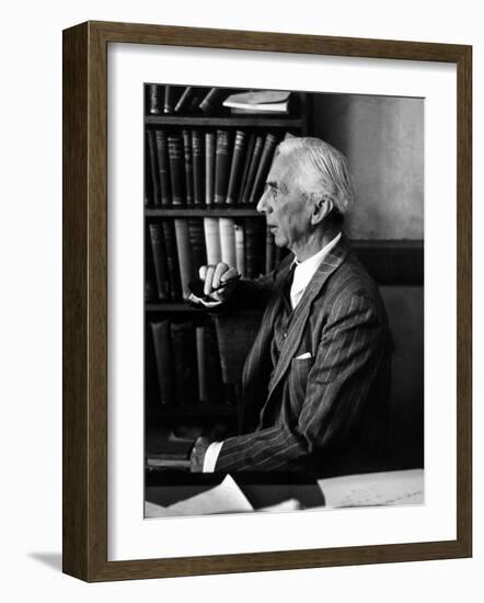 Bertrand Russell Sitting at His Desk at California University at Los Angeles-Peter Stackpole-Framed Photographic Print