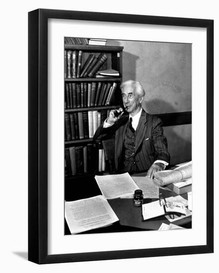 Bertrand Russell Sitting at His Desk at California University at Los Angeles-Peter Stackpole-Framed Photographic Print