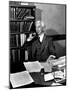 Bertrand Russell Sitting at His Desk at California University at Los Angeles-Peter Stackpole-Mounted Photographic Print