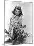 Bette Davis Arranging Flowers-null-Mounted Photo