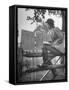 Betty Jane Baldwin Sitting on Fence and Looking at Official Board at Warrenton Horse Show-Martha Holmes-Framed Stretched Canvas