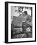 Betty Jane Baldwin Sitting on Fence and Looking at Official Board at Warrenton Horse Show-Martha Holmes-Framed Photographic Print