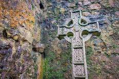 Elaborate Celtic cross marks a grave at a historic Irish church, County Mayo, Ireland.-Betty Sederquist-Photographic Print
