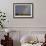 Bewick's swan in flight with rainbow, Gloucestershire, England, UK, February-David Kjaer-Framed Photographic Print displayed on a wall