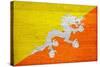 Bhutan Flag Design with Wood Patterning - Flags of the World Series-Philippe Hugonnard-Stretched Canvas