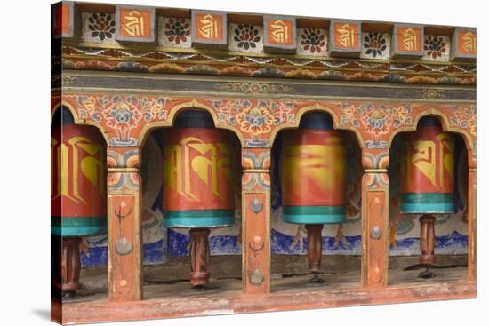 Bhutan, Paro. Spinning Prayer Wheel at the Rinpung Dzong-Brenda Tharp-Stretched Canvas
