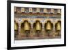 Bhutan. Spinning prayer wheels along a temple wall.-Brenda Tharp-Framed Photographic Print