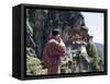 Bhutanese Man with Cell Phone, Taktshang Goemba (Tiger's Nest) Monastery, Paro, Bhutan, Asia-Angelo Cavalli-Framed Stretched Canvas