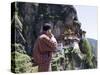 Bhutanese Man with Cell Phone, Taktshang Goemba (Tiger's Nest) Monastery, Paro, Bhutan, Asia-Angelo Cavalli-Stretched Canvas