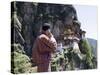 Bhutanese Man with Cell Phone, Taktshang Goemba (Tiger's Nest) Monastery, Paro, Bhutan, Asia-Angelo Cavalli-Stretched Canvas